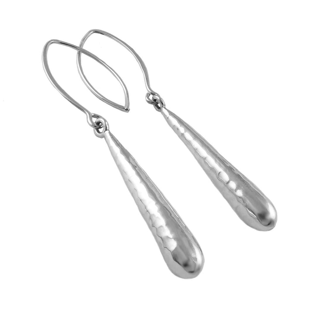 Pair of silver teardrop earrings on a white background