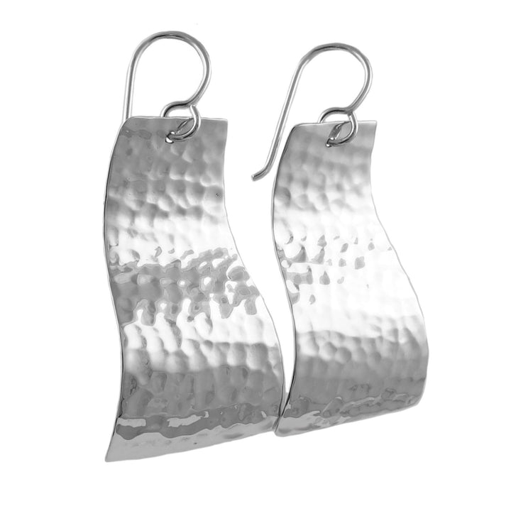 A pair of hammered 925 sterling silver curved drop earrings with hook closures.