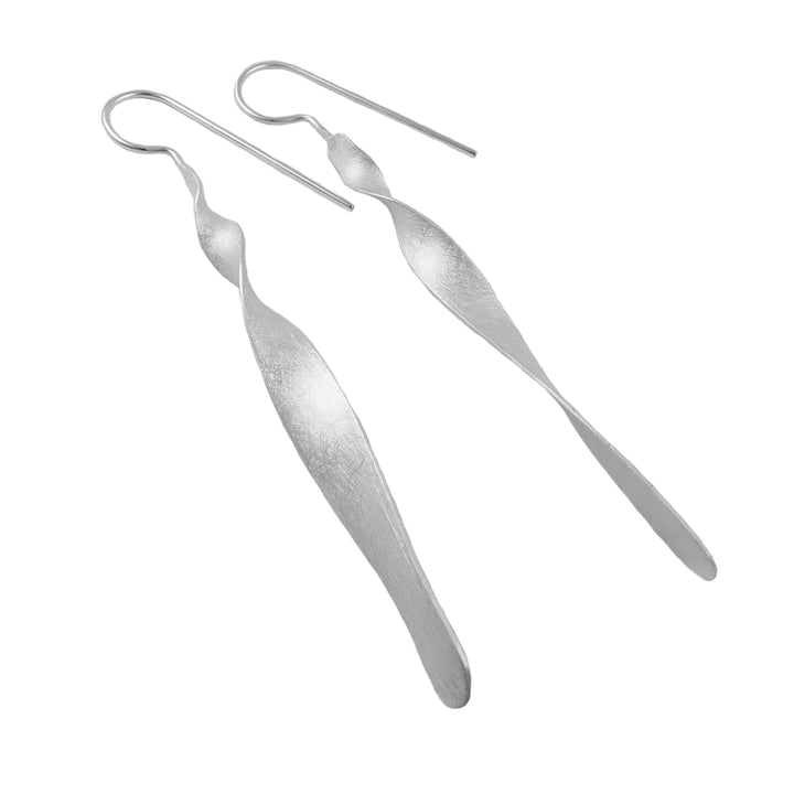 Long brushed silver drop earrings on a white background.