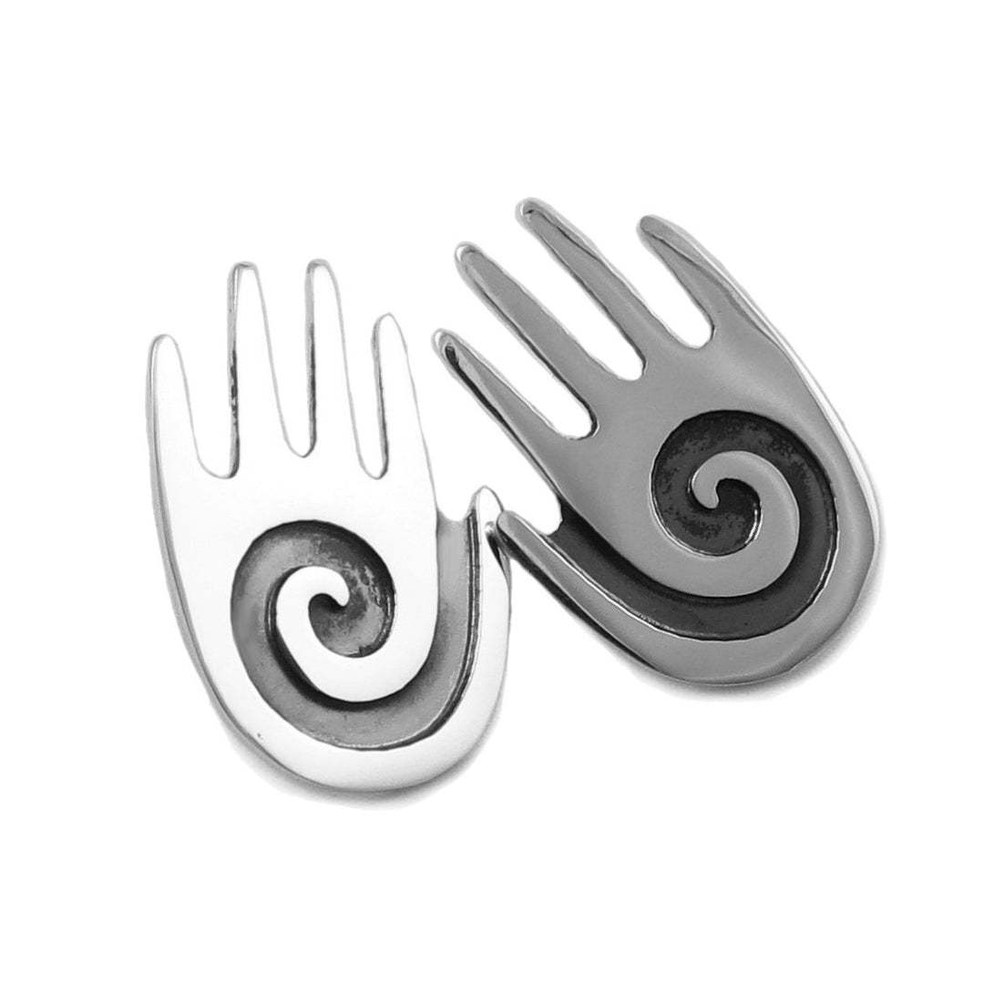 Sterling silver earrings with spiral design on a white background