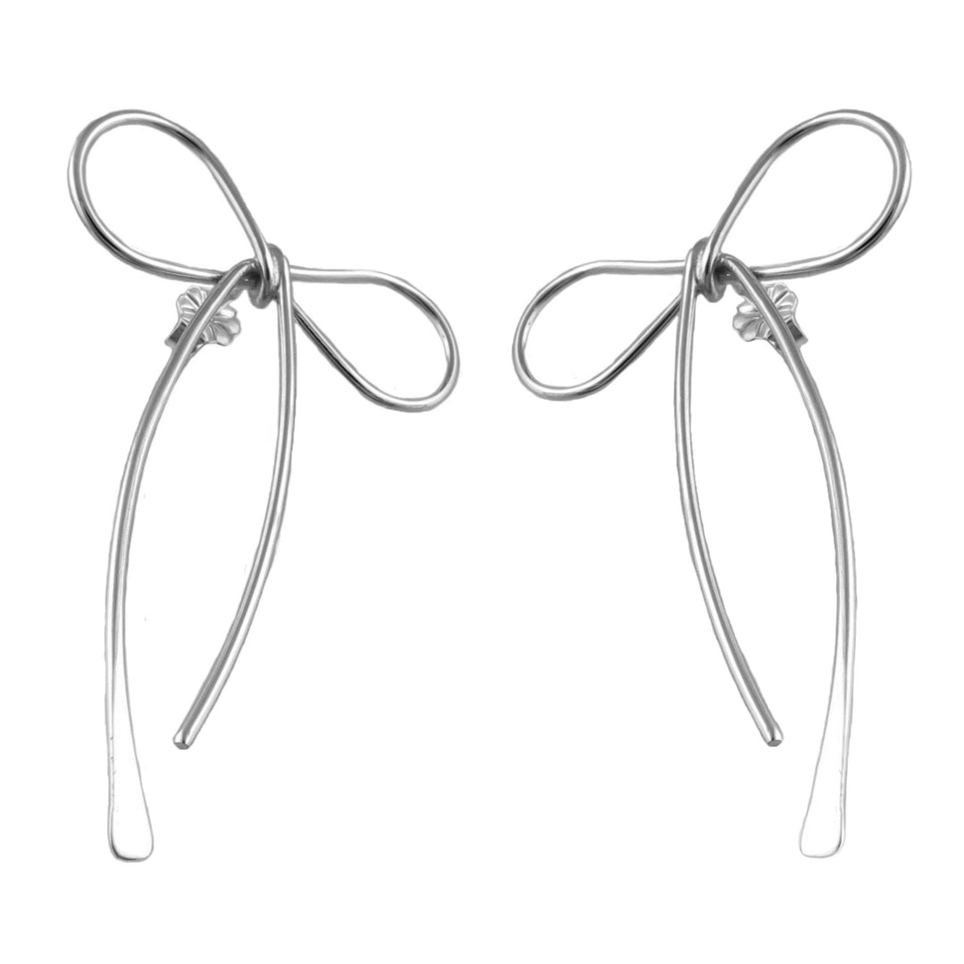 Long sterling silver bow earrings with flared drops on a white background