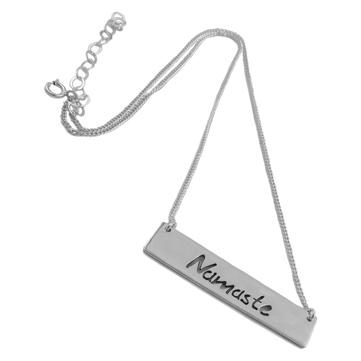 Sterling silver tag necklace inscrived with the word namaste.