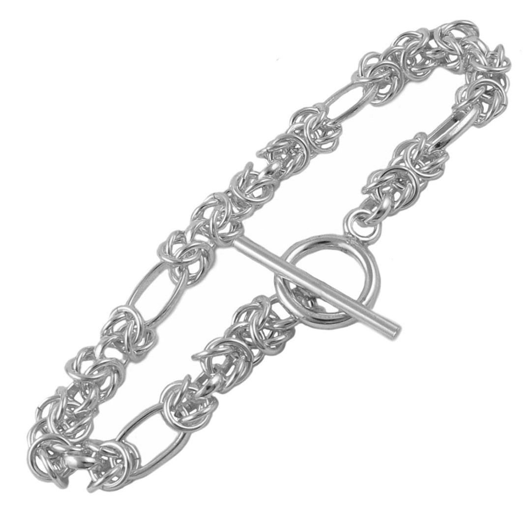 A sterling silver Byzantine chain link bracelet with a combination of interspersed Byzantine links and wide oval links, featuring a toggle closure.