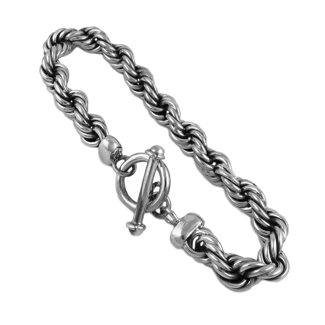 Chunky sterling silver rope chain bracelet on a white background.