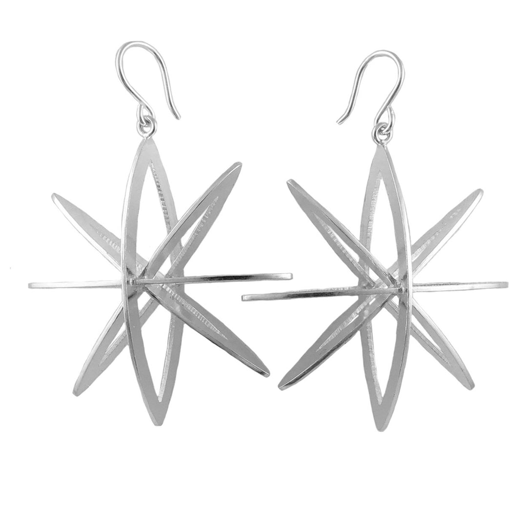 Geometric octagram star earrings in sterling silver on the white backgroud.
