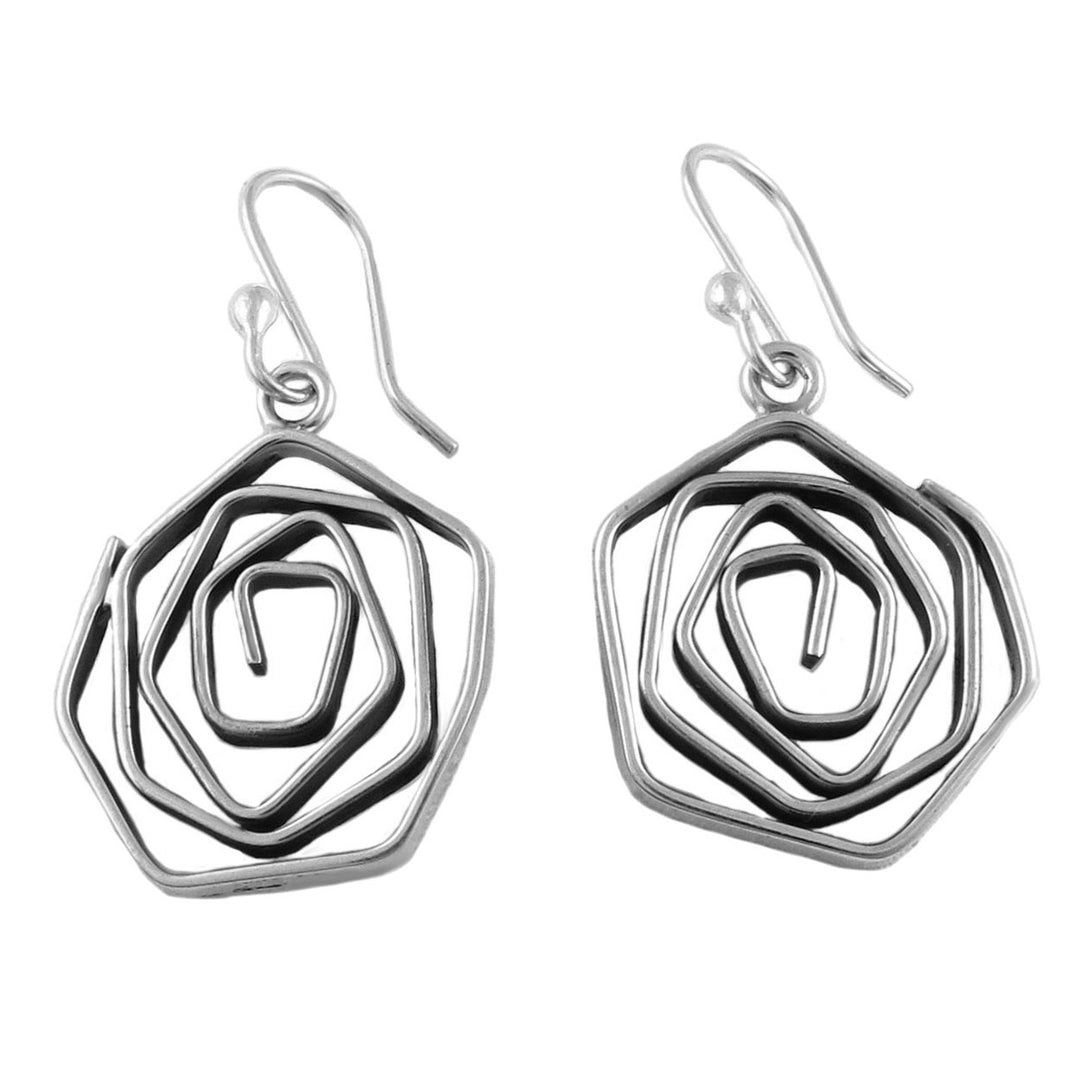 A pair of silver spiral drop earrings with a minimalist design, showing a coiled and asymmetrical shape on a white background.