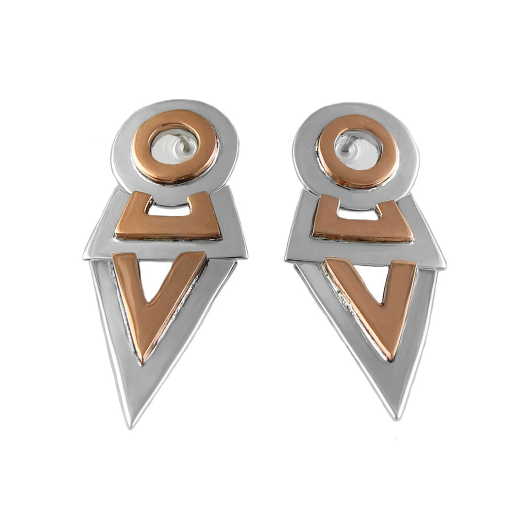 Designer Maria Belen Nilson silver and copper pre-hispanic design earrings on a white background.