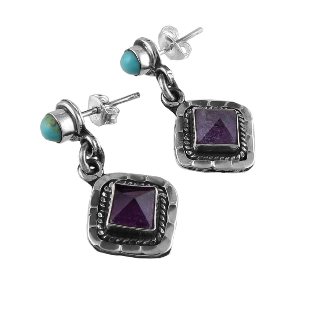 A pair of Baroque-inspired amethyst gemstone earrings with turquoise accents, set in sterling silver with a antiqued finish.