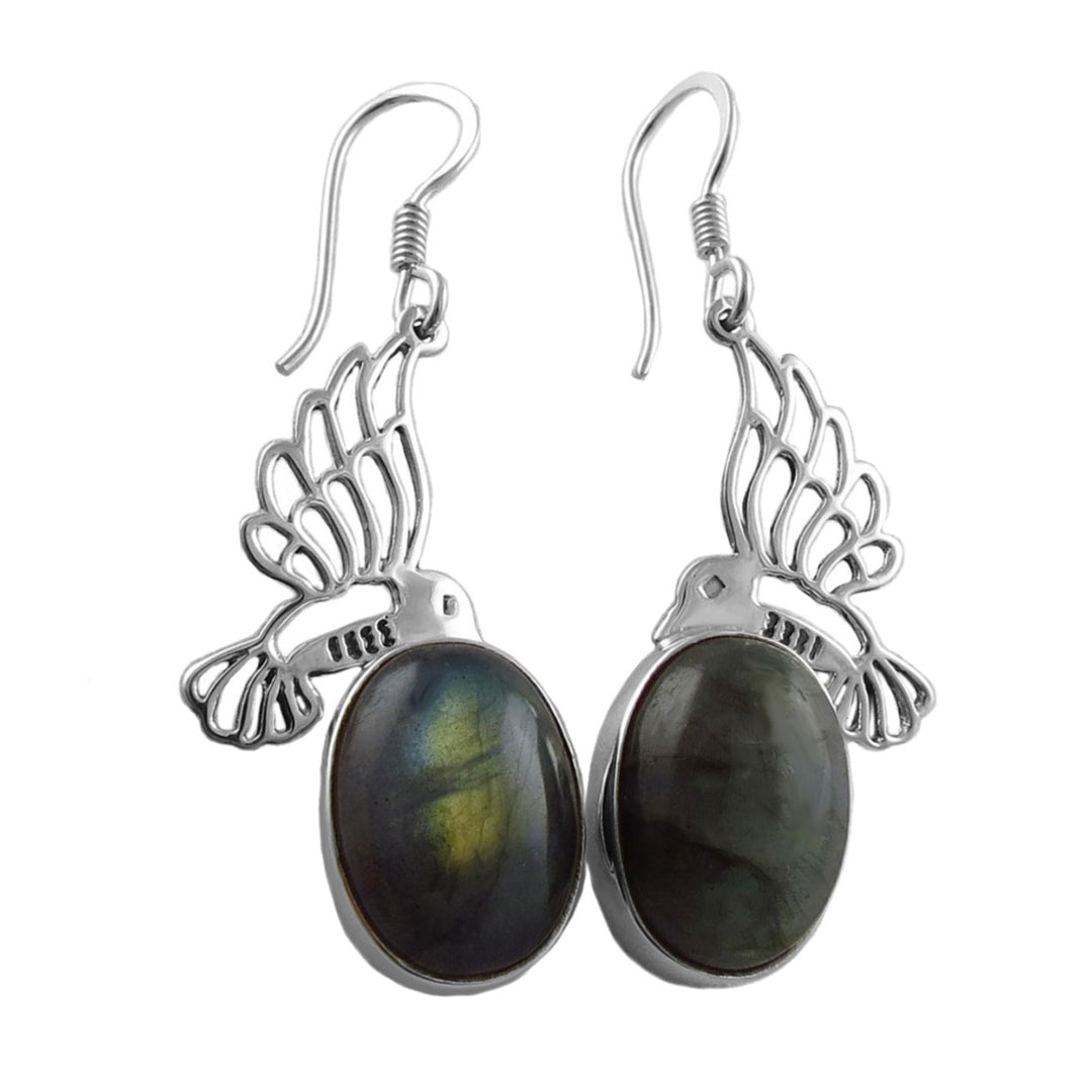 A pair of deep green chrysocolla gemstone earrings with sterling silver mounting and hooks.