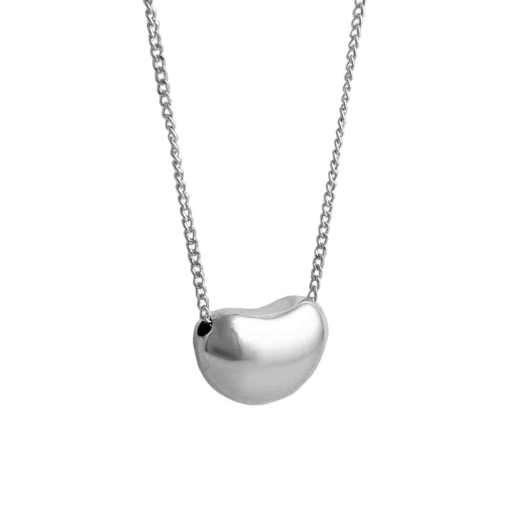 A sterling silver necklace with a hollow three-dimensional puffed bean shape on a chain.