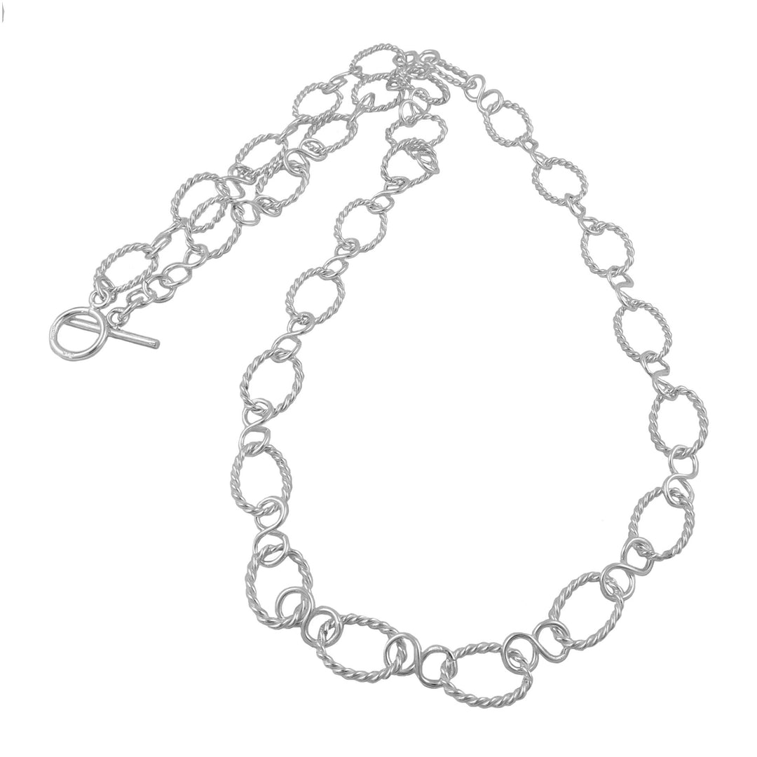 A sterling silver fancy chain necklace with large twisted hoops and polished figure of eight links.
