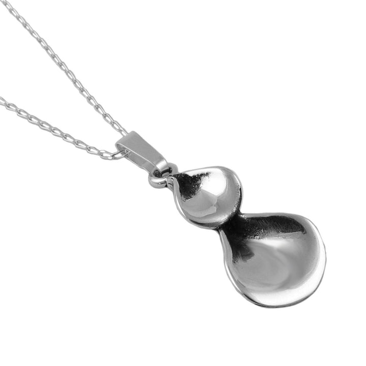 Silver necklace with a unique pendant on a white background