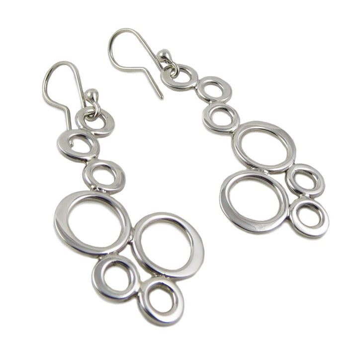 Silver bubble drop earrings on a white background