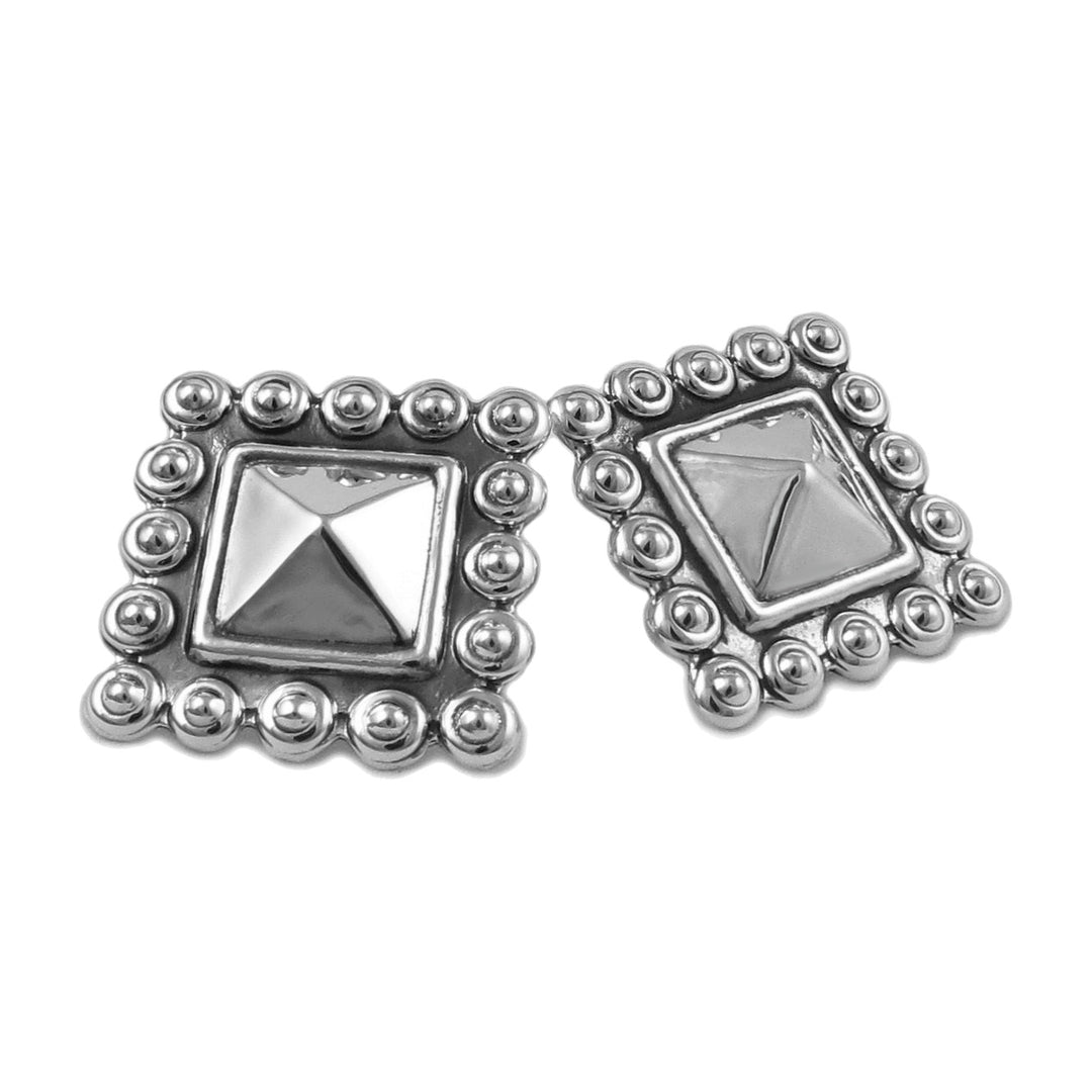 Square stud earrings in sterlng silver on a white background.