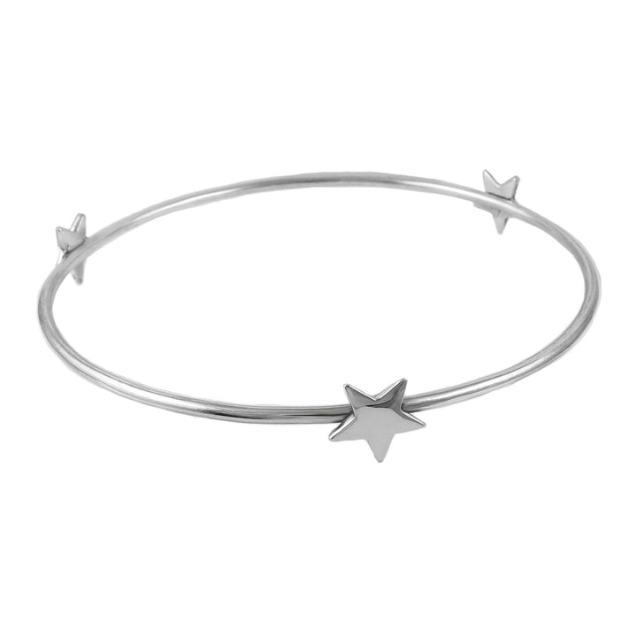 Large sterling 925 silver circle bangle for women with star-shaped accents on a white background