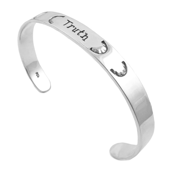 Large 925 sterling silver bracelet cuff for women inscribed with the word 'Truth' on a white background