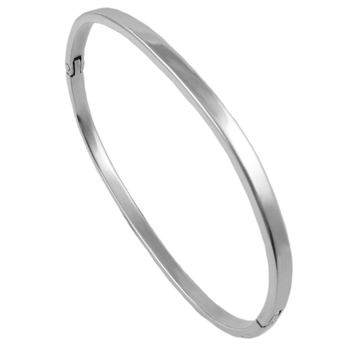 A large oval sterling 925 silver ladies bangle cuff on a white background. 