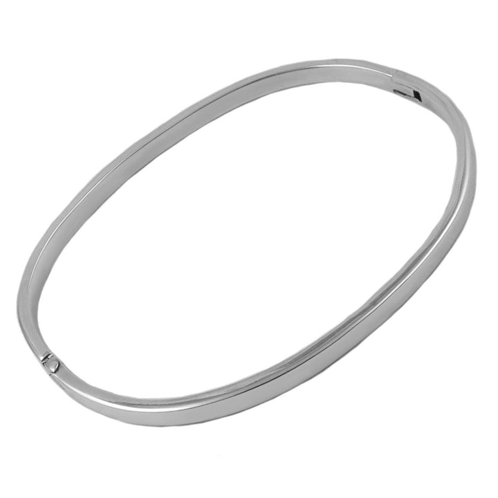A large oval sterling 925 silver solid bangle style hinged bracellet on a white background