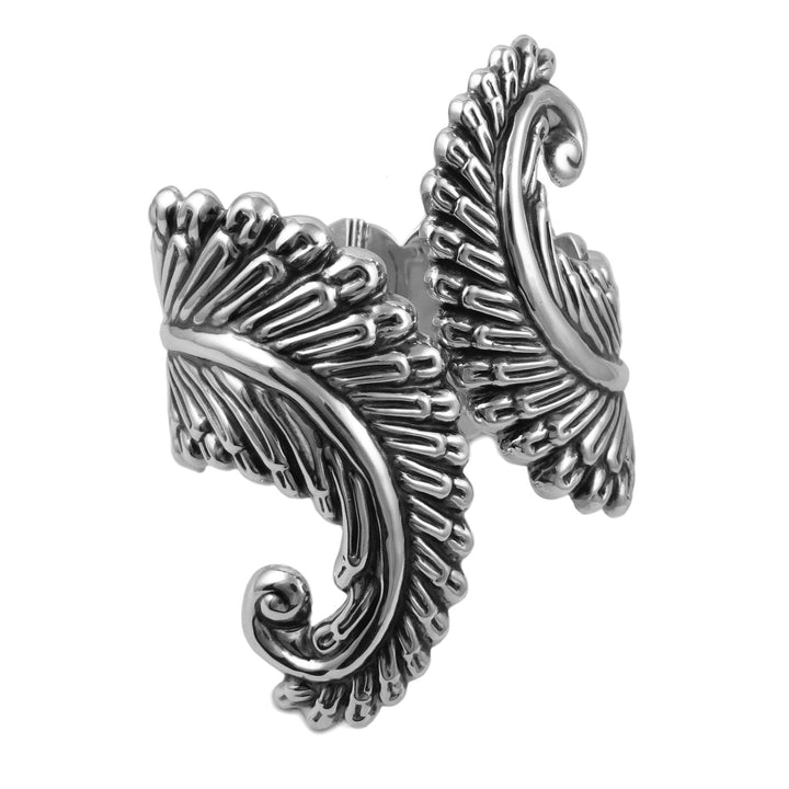 A large Mexican 925 sterling silver clamper bracelet cuff featuring a fern leaf motif on a white background. 