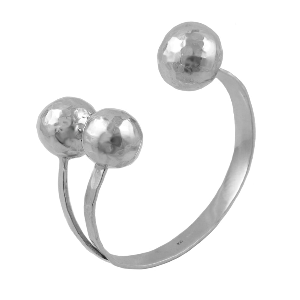 A large hammered sterling 925 silver  triple ball bead cuff style bracelet on a white background