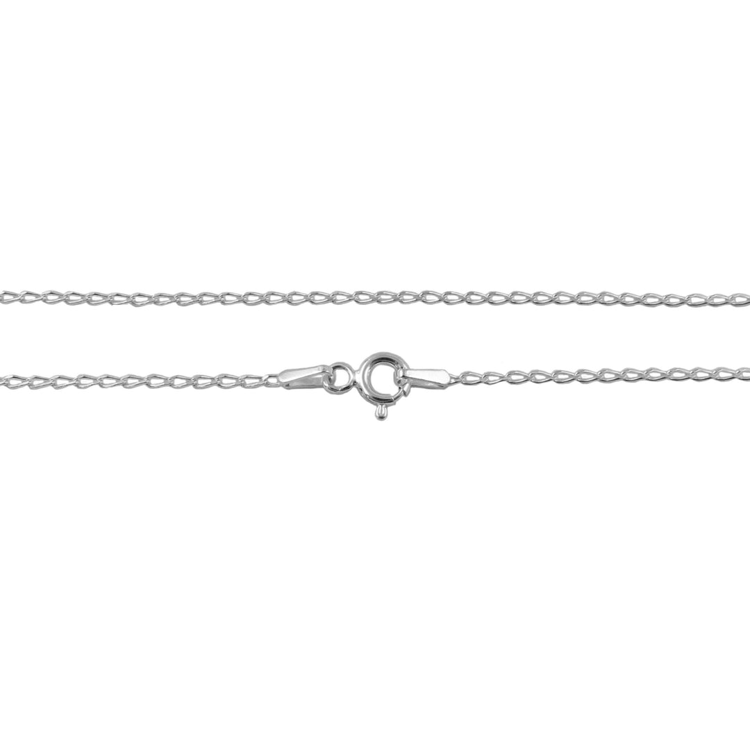 Silver curb chain necklace on a white background