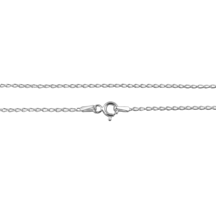 Silver curb chain necklace on a white background