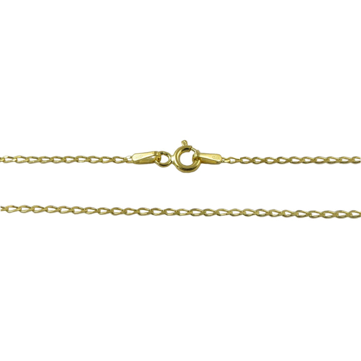 Gold curb chain necklace on a white background