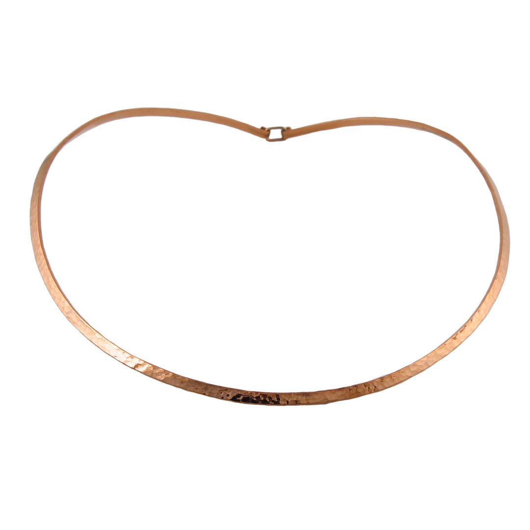 Hammered copper necklace choker for women on a white background