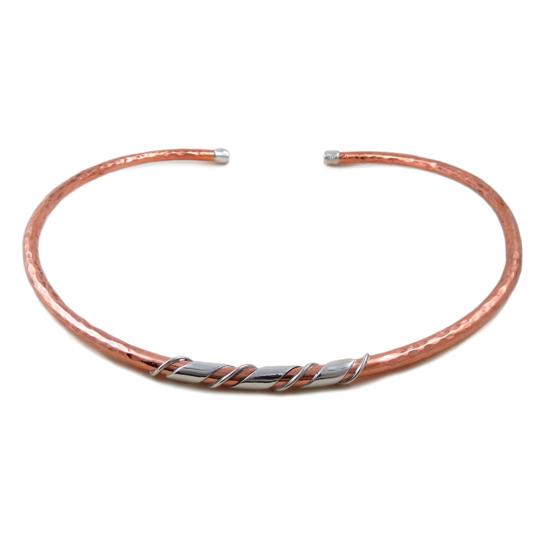Hammered ladies copper choker necklace with sterling silver spiral accents on a white background.