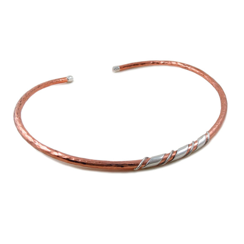 A large copper choker torque with 925 silver accents on a white background