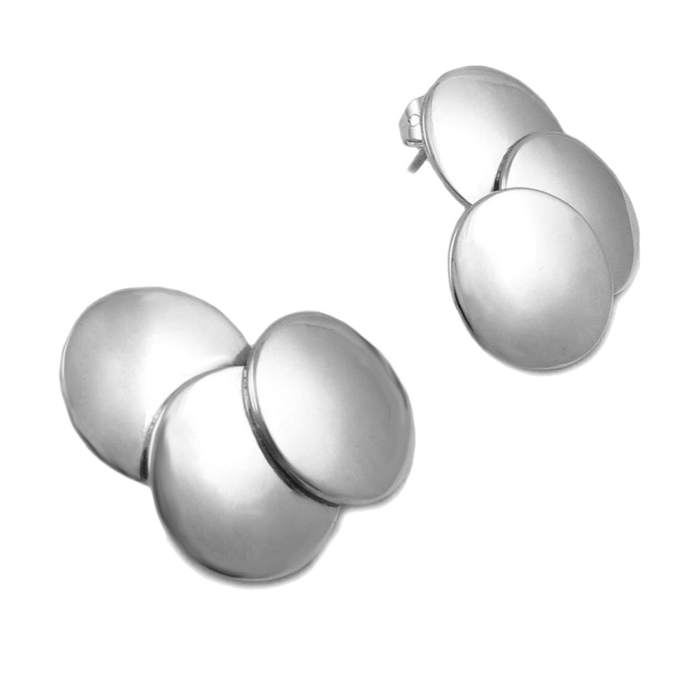 Pair of sterling 925 silver sculpted triple disc earrings on a white background