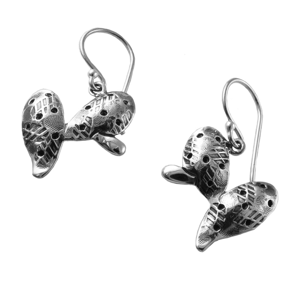 Silver cactus earrings on a white baxkground. 