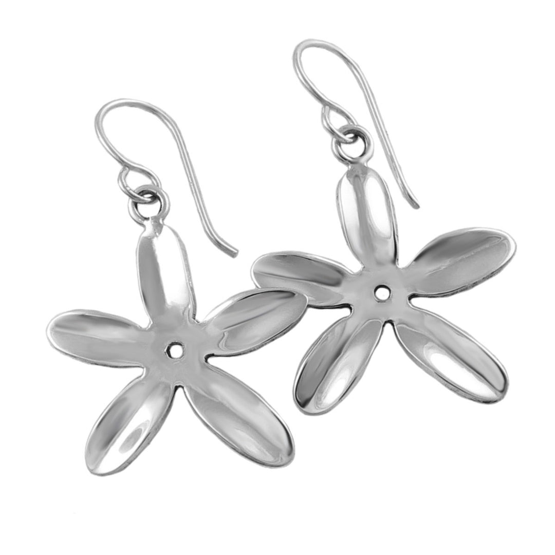 Large floral daisy flower earrings jewellery in solid 925 silver with a polished finish on a white background