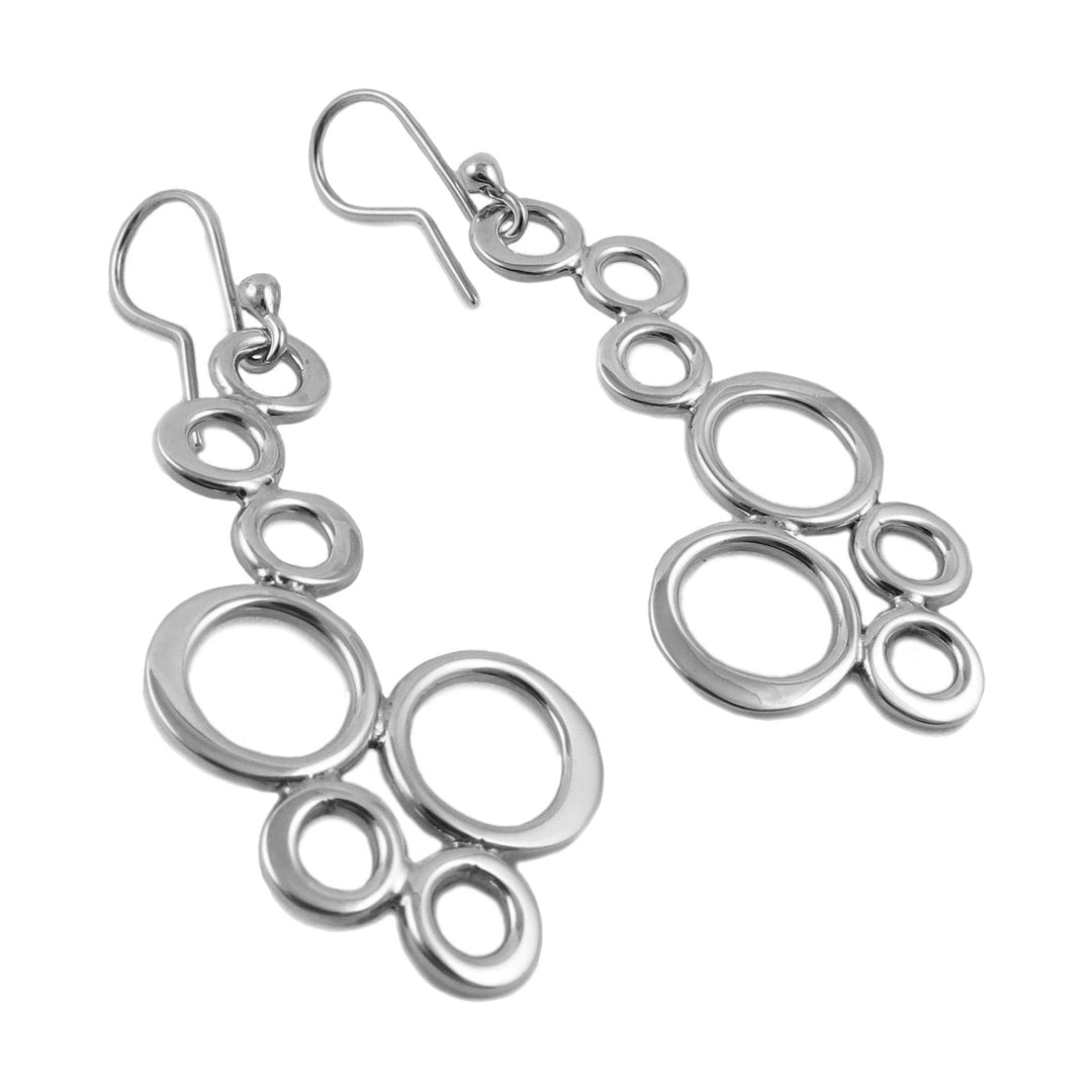 Silver bubble earring for women on a white background. 