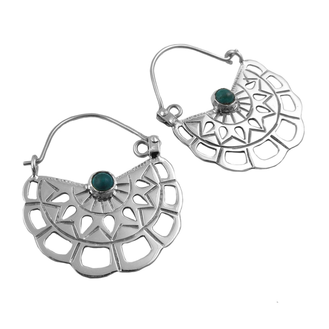 Sterling 925 silver earrings with turquoise gemstones on a white background