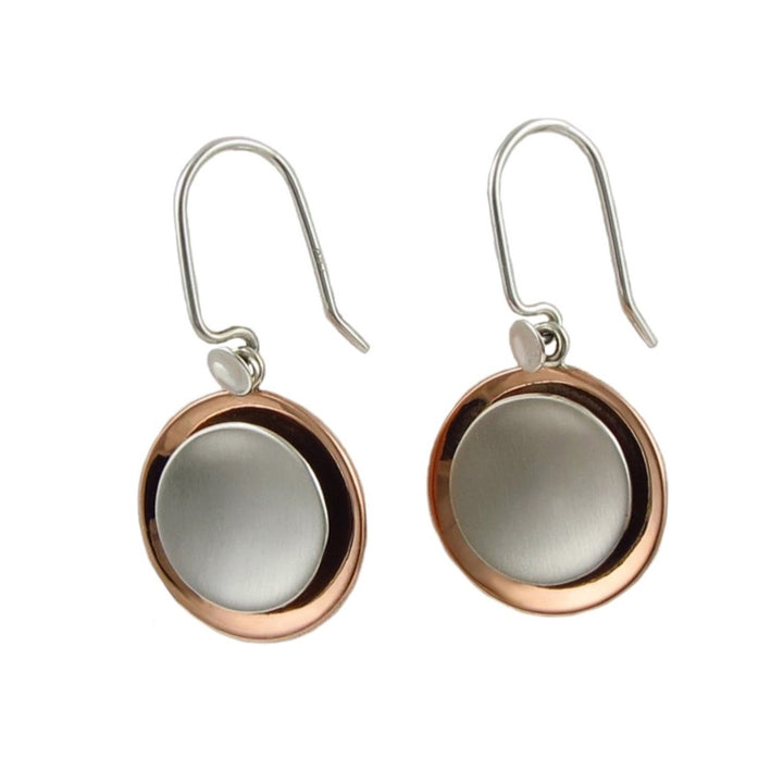 Modern mixed metal earrings for women in 925 sterling silver and copper on a white background