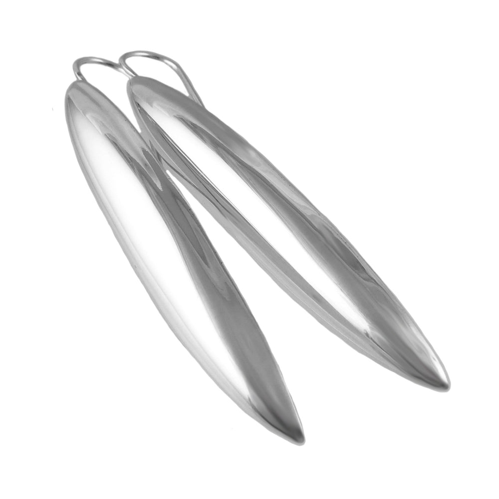 Pair of silver drop earrings on a white background
