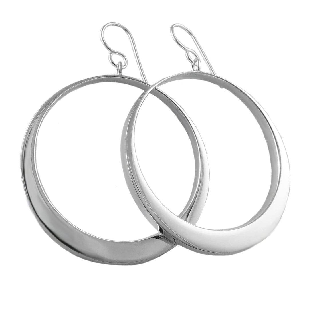 Pair of silver hoop earrings on a white background