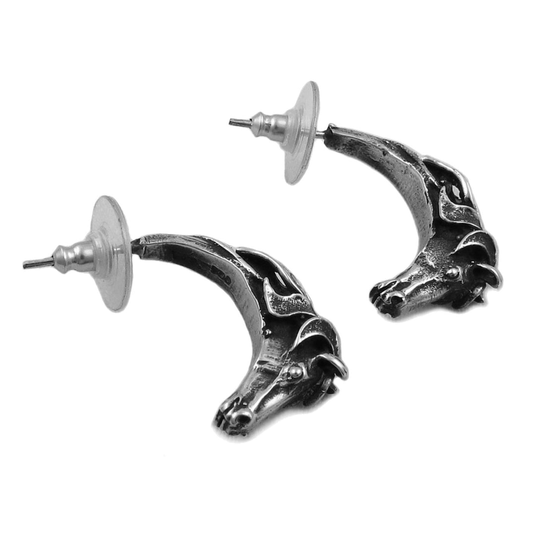 Pair of sculpted solid sterling 925 silver horse head earrings on a white background