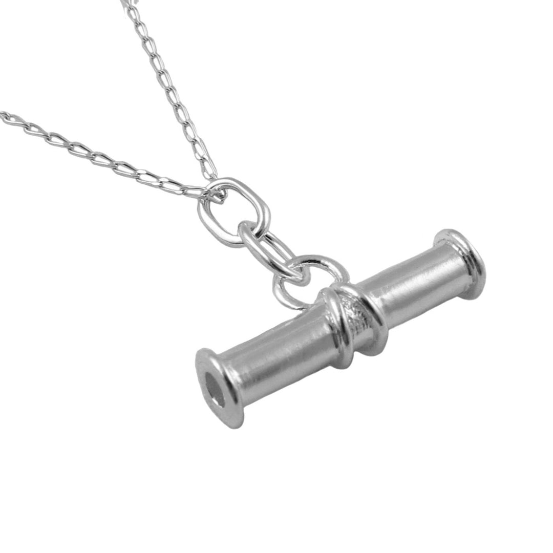 A medium sized t-bar 925 sterling silver cylindrical albert pendant on a curb chain against a white background