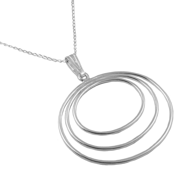 Large oval 925 sterling silver statement pendant and chain necklace with three interlocking rings on a white background