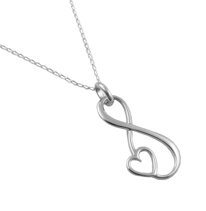 925 Silver necklace with an infinity figure of eight and love heart  symbol pendant on a curb chain against a white background