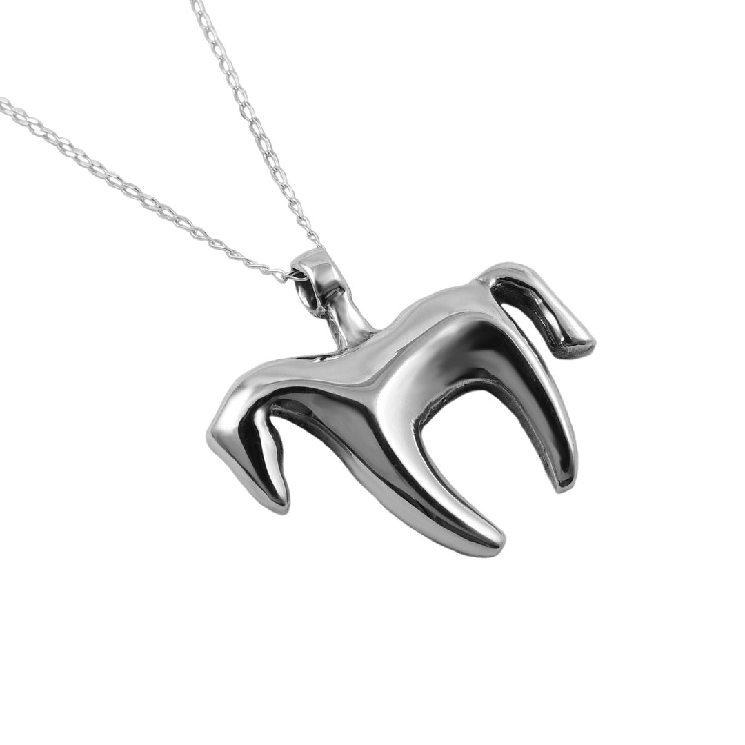 A large sterling 925 silver polished modern horse silhouette pendant and chain necklace on a white background. 