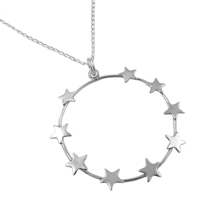 A 925 sterling silver circle pendant framed by small star shapes hanging on a silver curb chain against a white background. 