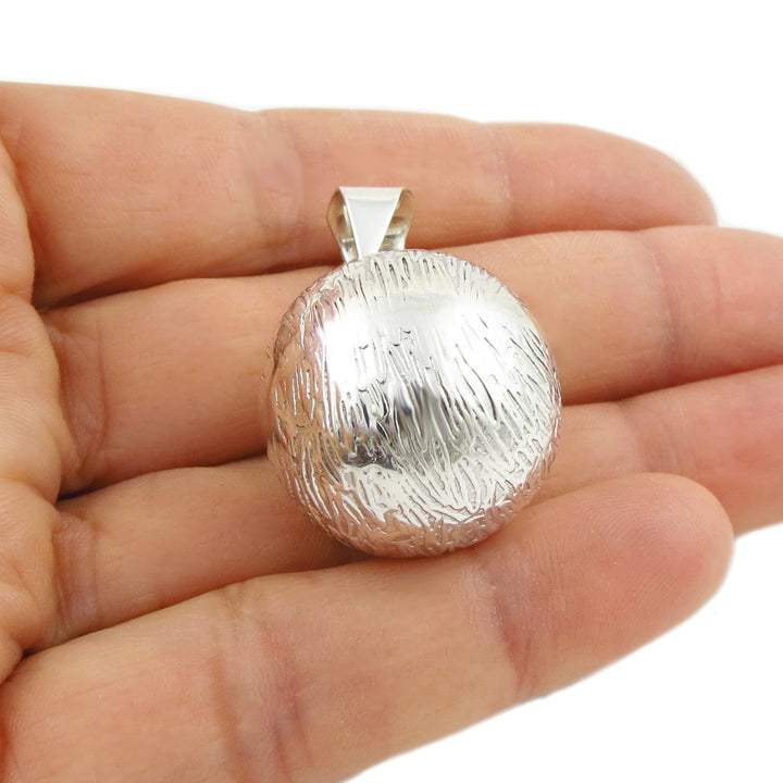 Bola Chime Silver Ball Pendant Necklace