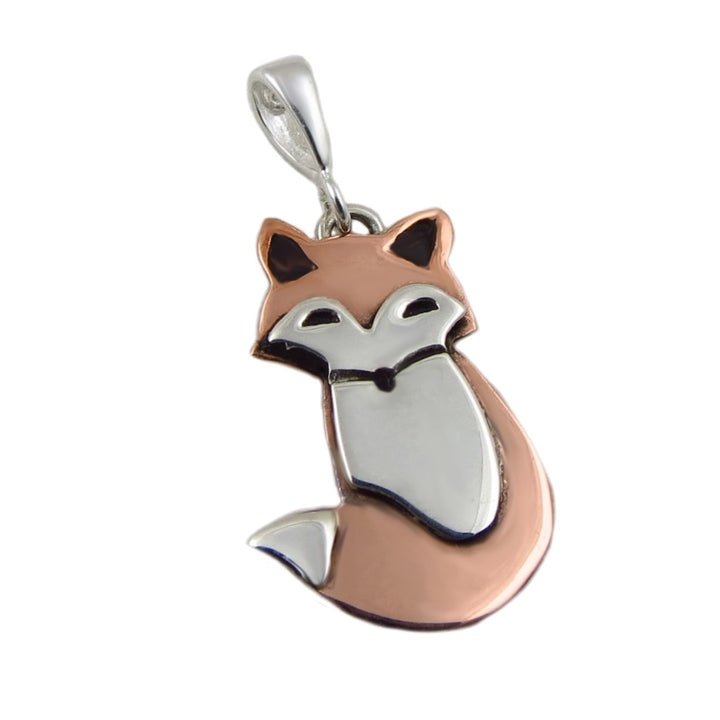 A unique fox design pendant handmade from 925 silver and copper on the white background. 