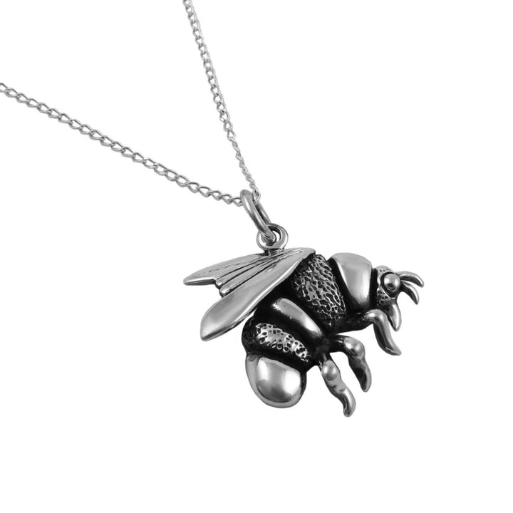 Large sterling 925 silver bumble bee pendant and chain necklace for women on a white background