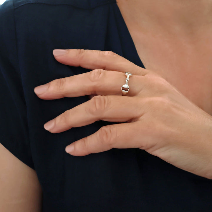 Woman wearing a sterling 925 silver horsebit snaffle equestrian design ring