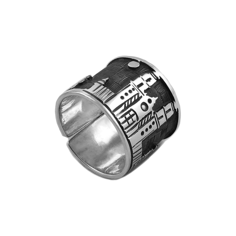 A sterling silver ring with a blackened niello base featuring a raised outline of Santa Prisca Church in Taxco, Mexico.