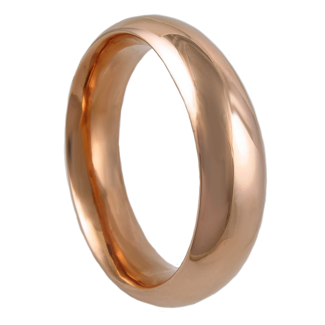 A large sculpted copper bangle with a polished finish on a white background. 